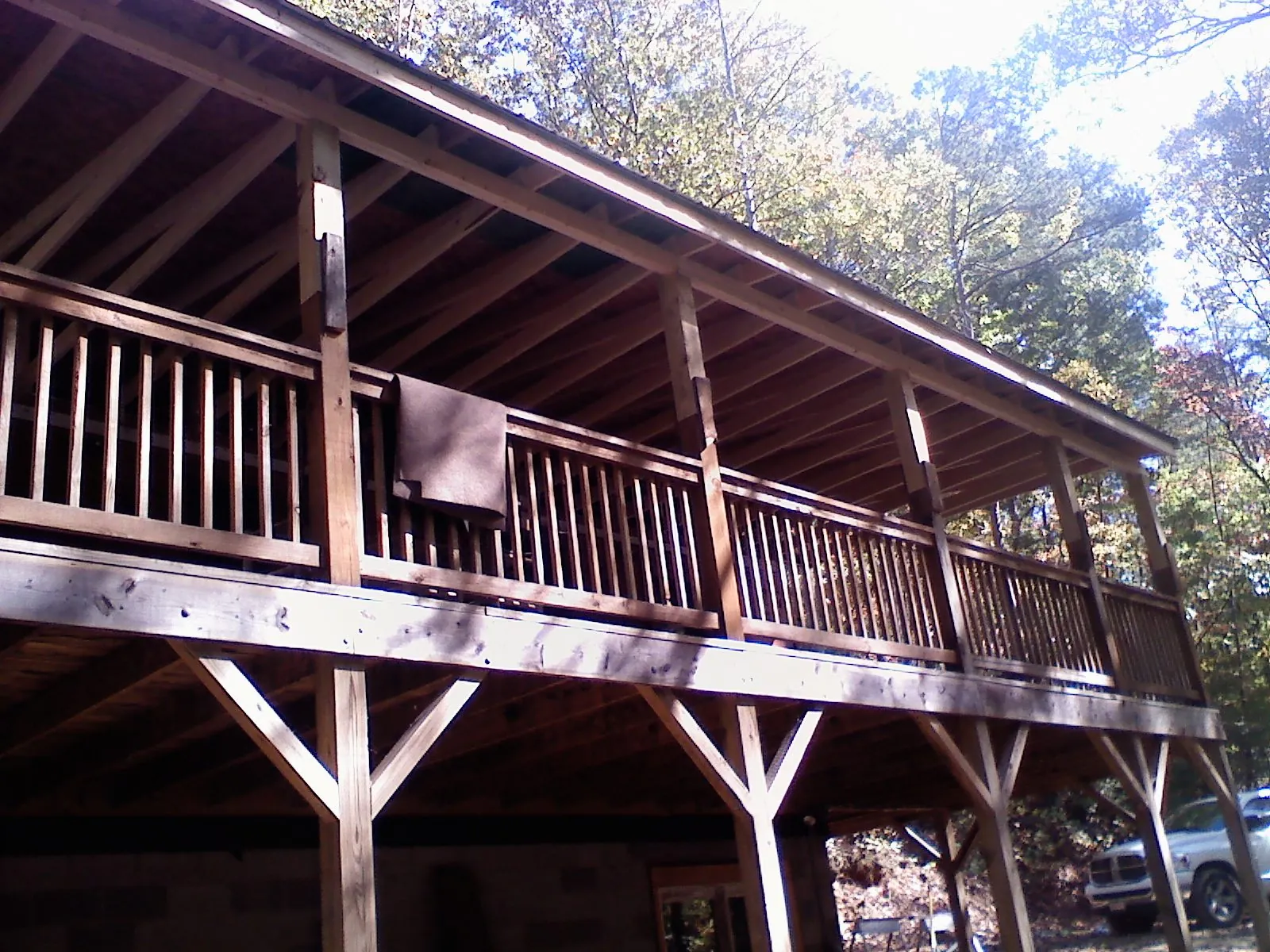 Timber framing under a new elevated porch and deck — Roof Leak Repair in Hemet by Roofing Brothers